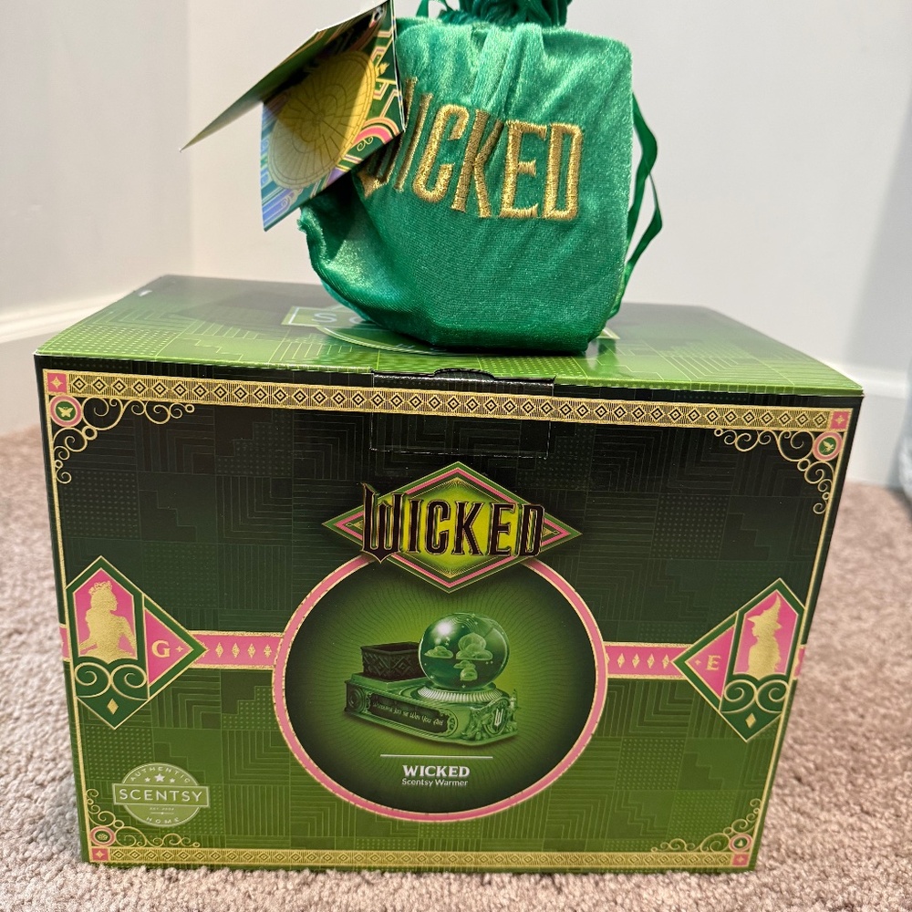 Brand new Scentsy Wicked Wax Warmer with special edition wax trio